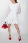 White short dress with pleated cuffs and hem