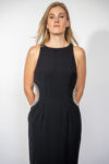Black long dress with a cut-out waist adorned with silver gems